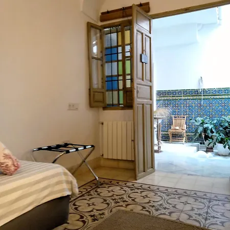 Con Encanto En Casa De Patio Séjour chez l'habitant *